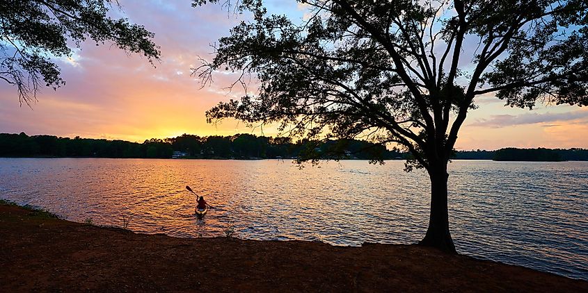 Kayaker on Lake Keowee at Sunset.