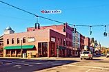 Penn Yan, New York: ‘Bank of the Finger Lakes’ in Downtown Main Street at corner of the intersect, with direction sign of Lake Keuka, RedBridge - stock.adobe.com
