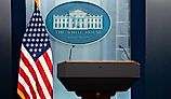 View of an empty WHITE HOUSE press room. Image credit Cristi Dangeorge via Shutterstock.